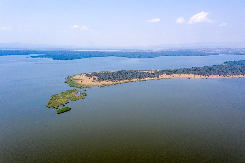 Aerial of sandy peninsula in lake in Akagera, Rwanda