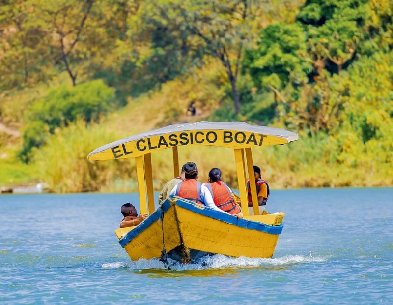 Yellow passenger boat crossing the lake in Lake Kivu, Rwanda