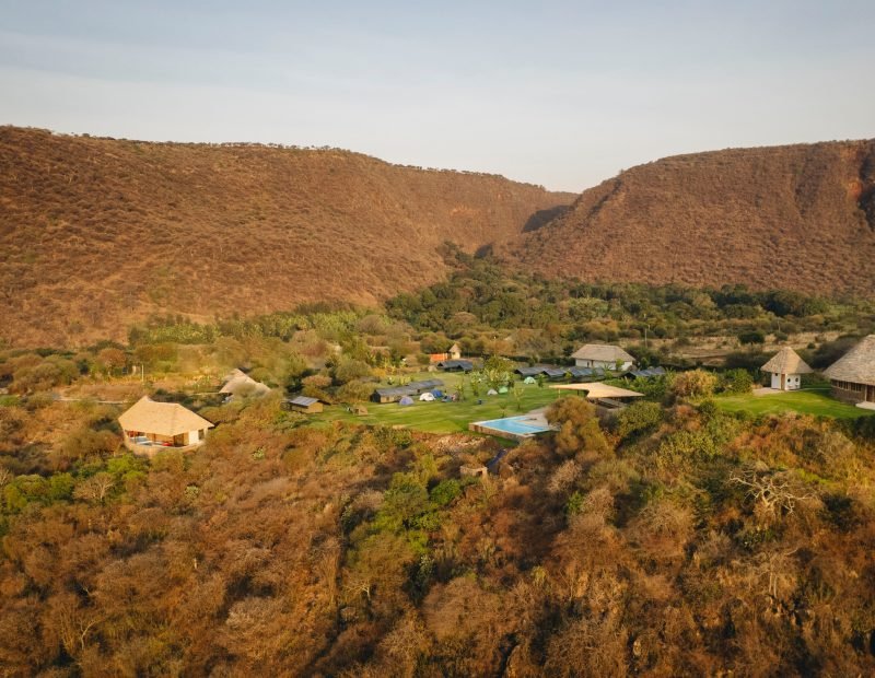 Lodge below the forested rift escarpment