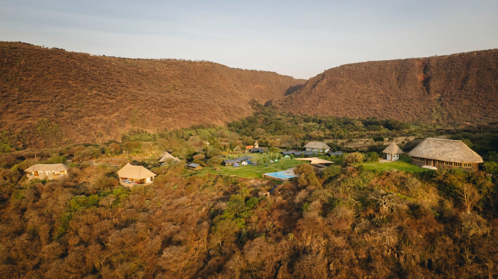 Lodge below the forested rift escarpment