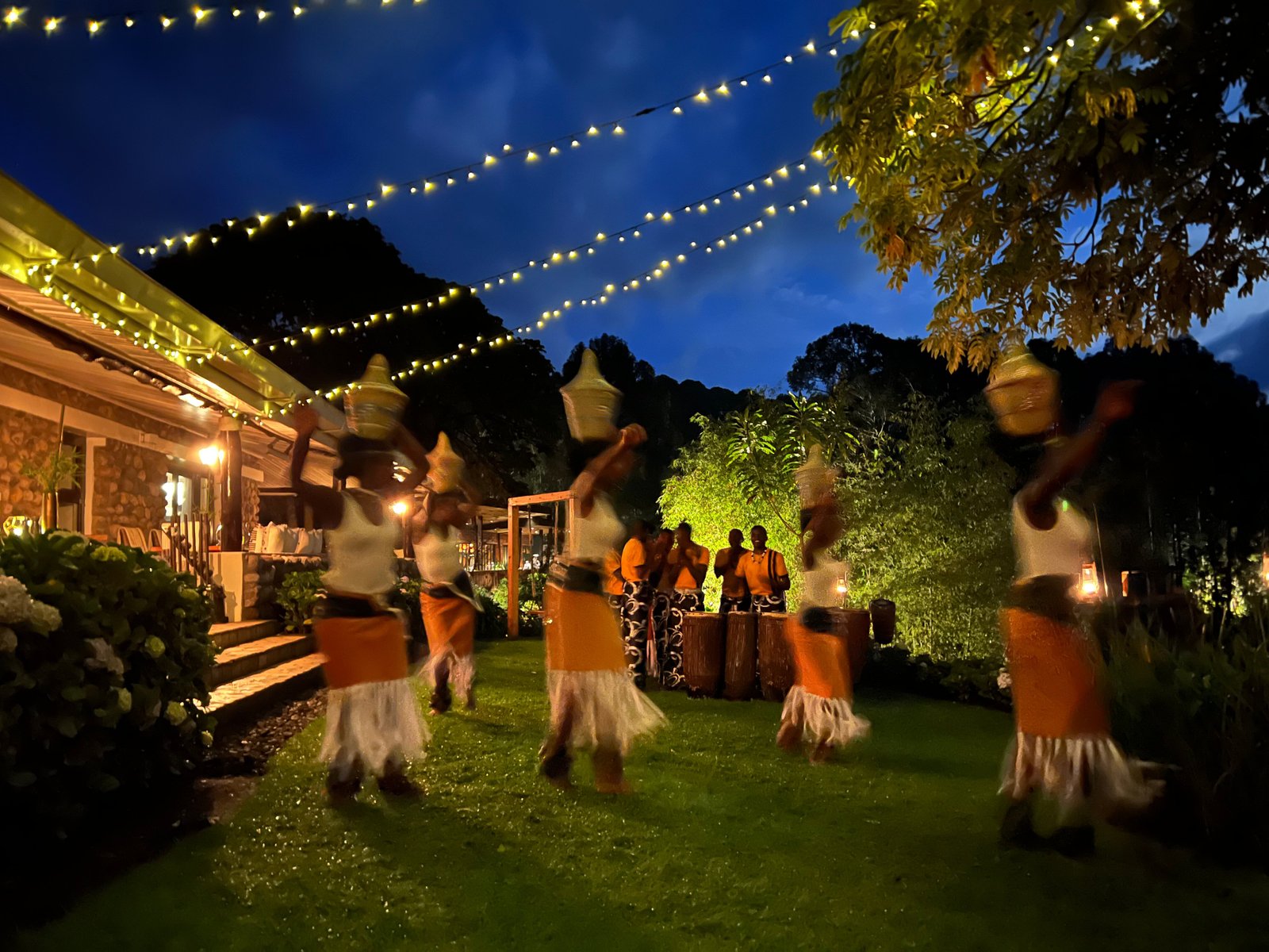 Evening traditional dance performance at a lodge near Musanze